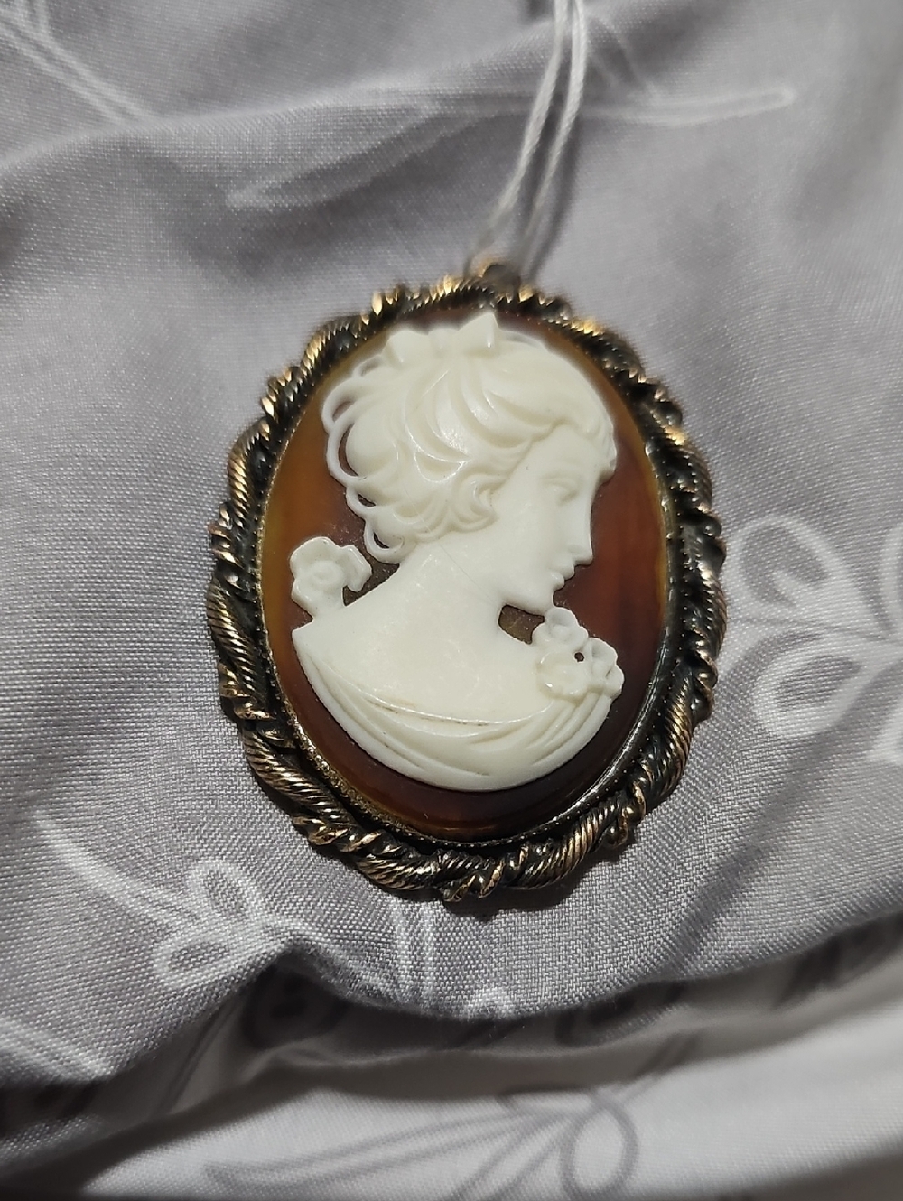 Classic White Cameo Pendant on Brown Base with Gold-Tone Frame